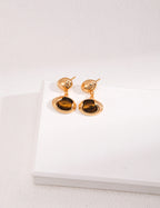 15mm x 10mm Tiger Eye earrings offering perfect proportion and balance with golden-brown bands.