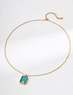 Close-up of 2x1.3cm amazonite pendant showing blue-green crystal details