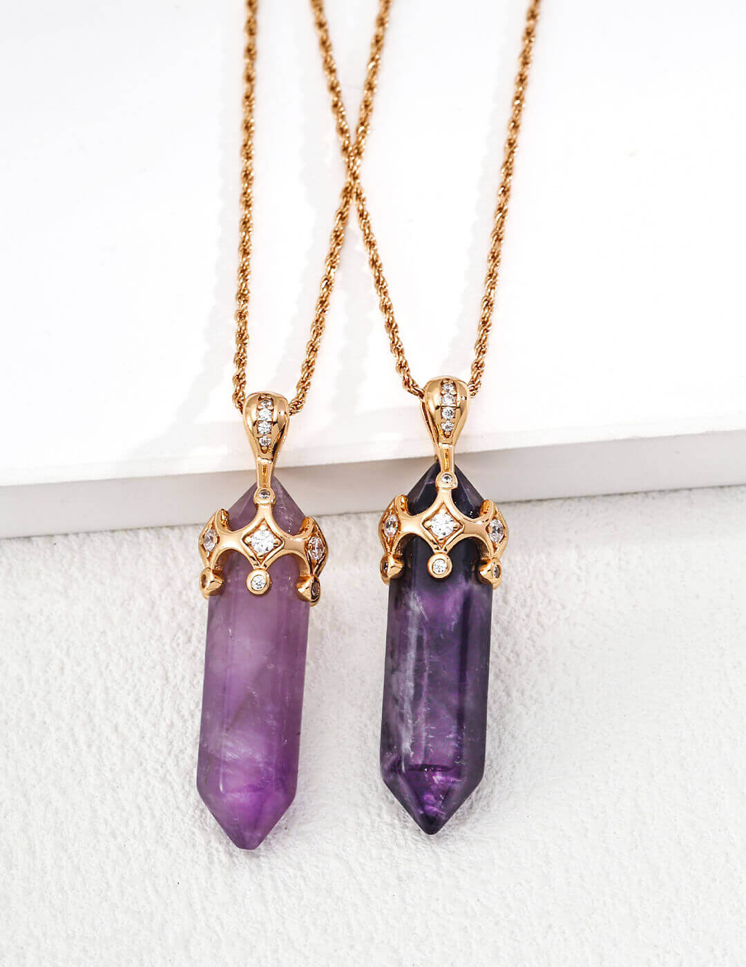 Front view of the gold amethyst and zircon crown pendant necklace.