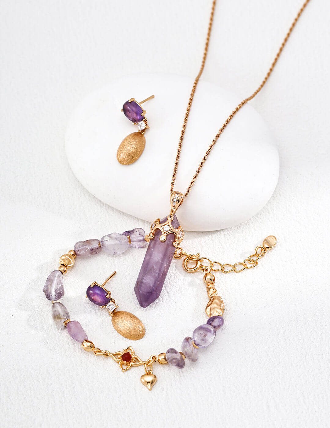 The amethyst necklace paired with a casual daytime look.