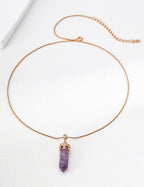 The necklace adding a touch of magical elegance to an evening outfit.