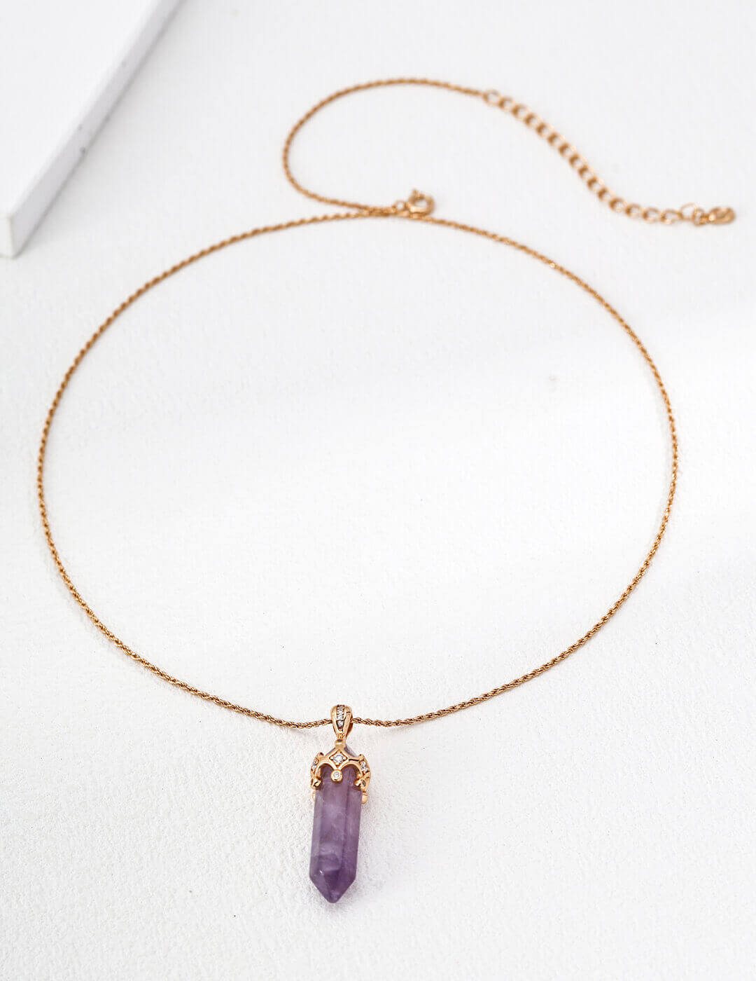 The necklace adding a touch of magical elegance to an evening outfit.
