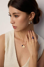 Side view of the Lapis Lazuli, Shoushan Stone, and pearl earrings on a model, showcasing their elegant 3cm drop and bohemian flair.
