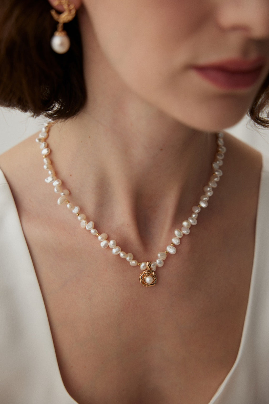 Detailed shot of the camellia flower shape, symbolizing ideal love and pure affection.