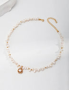 Close-up of the exquisite camellia-shaped pendant with natural pearls in S925 silver.