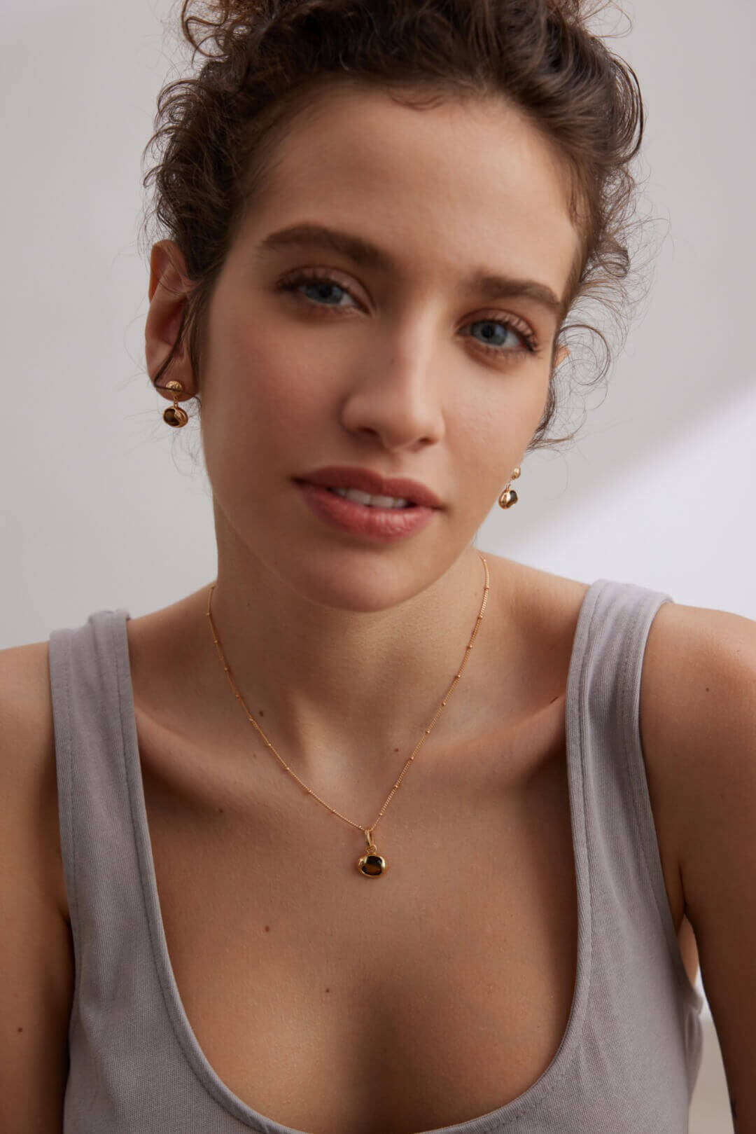 Earthy Tiger Eye set elevating casual daytime outfits with nature-inspired elegance and style.