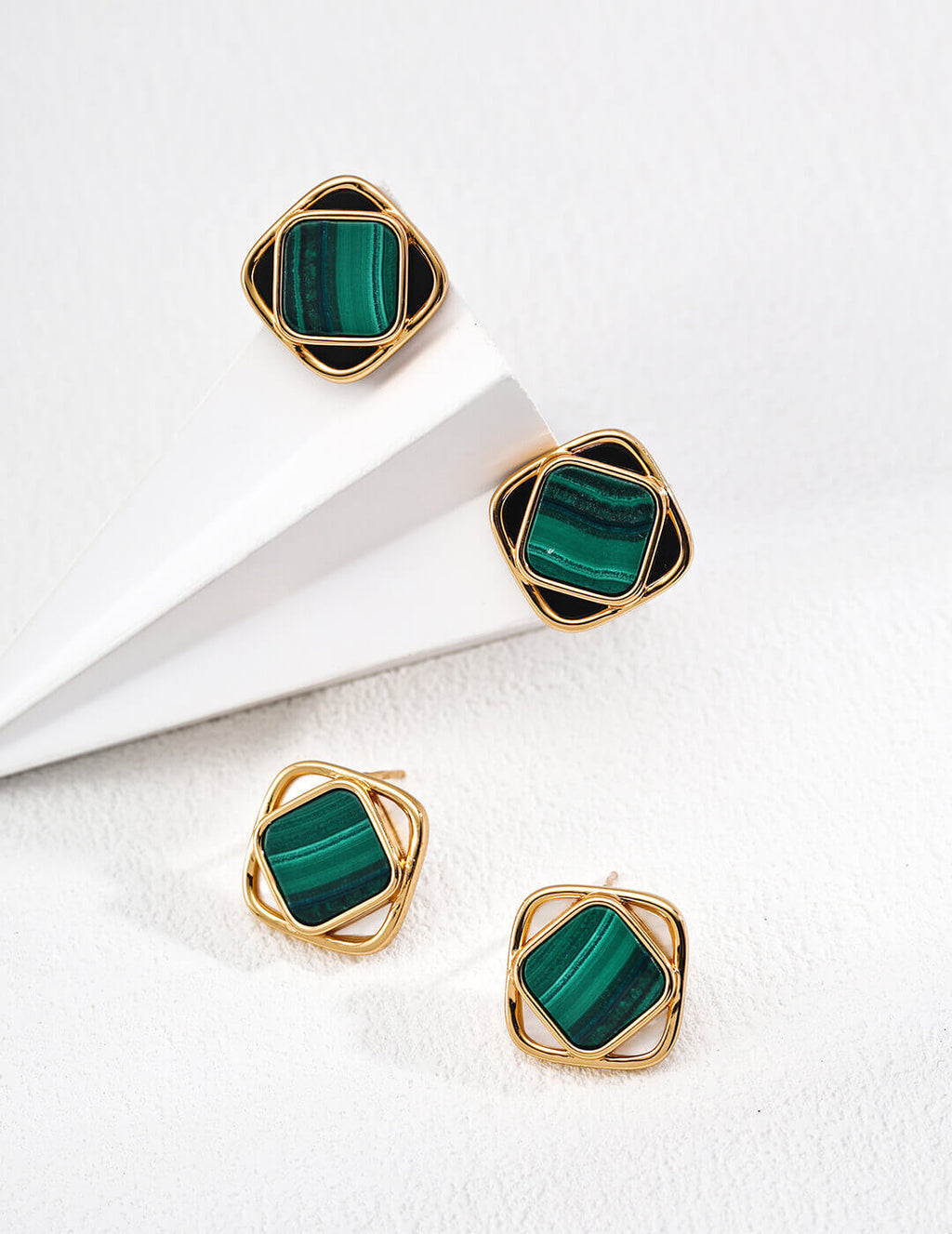 Close-up of the celestial design: white shell as the moon and green malachite against black onyx for a romantic starry night sky.