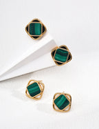 Close-up of the celestial design: white shell as the moon and green malachite against black onyx for a romantic starry night sky.