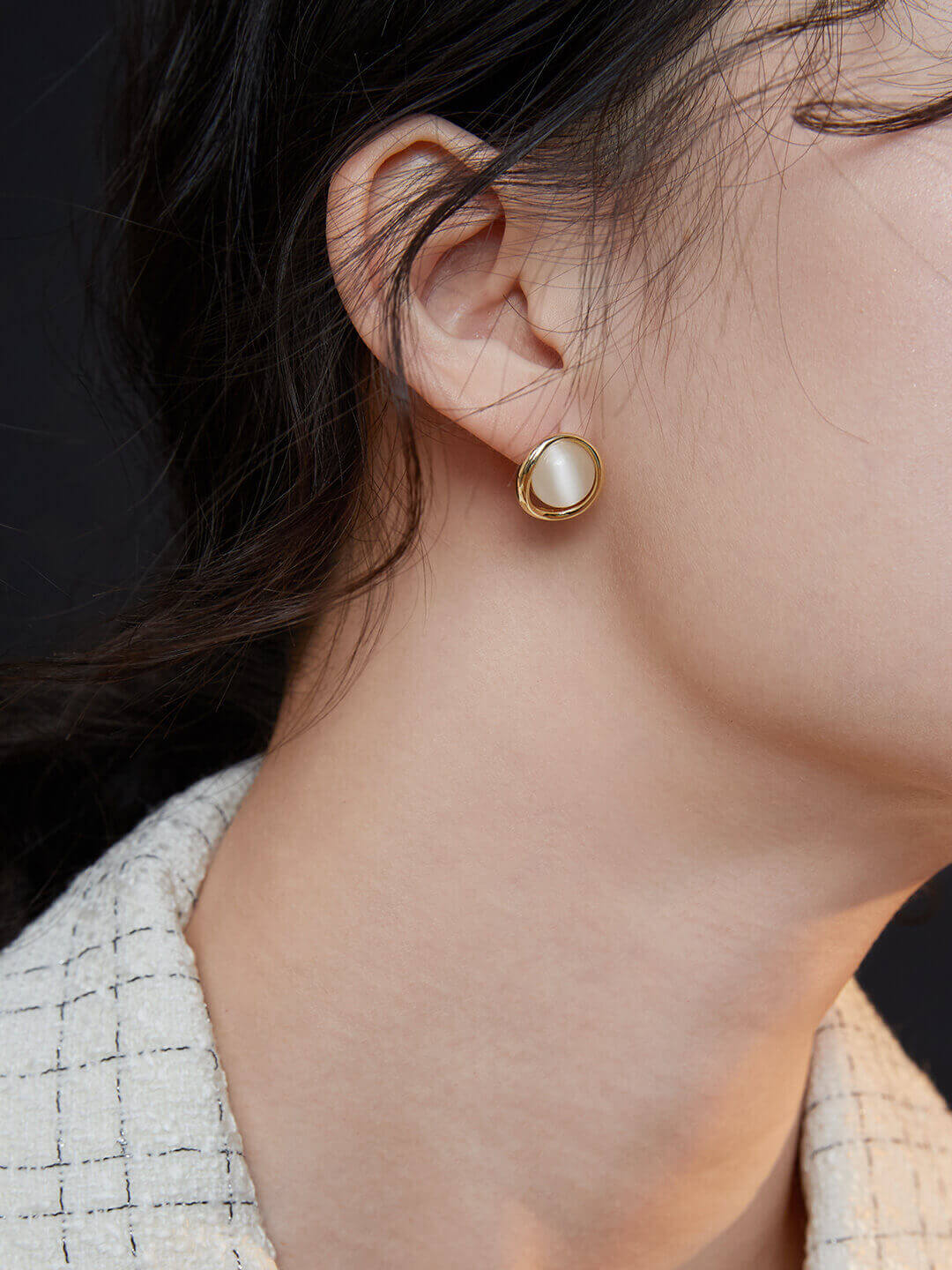 Front view of K gold plated Cat's Eye stone stud earrings.