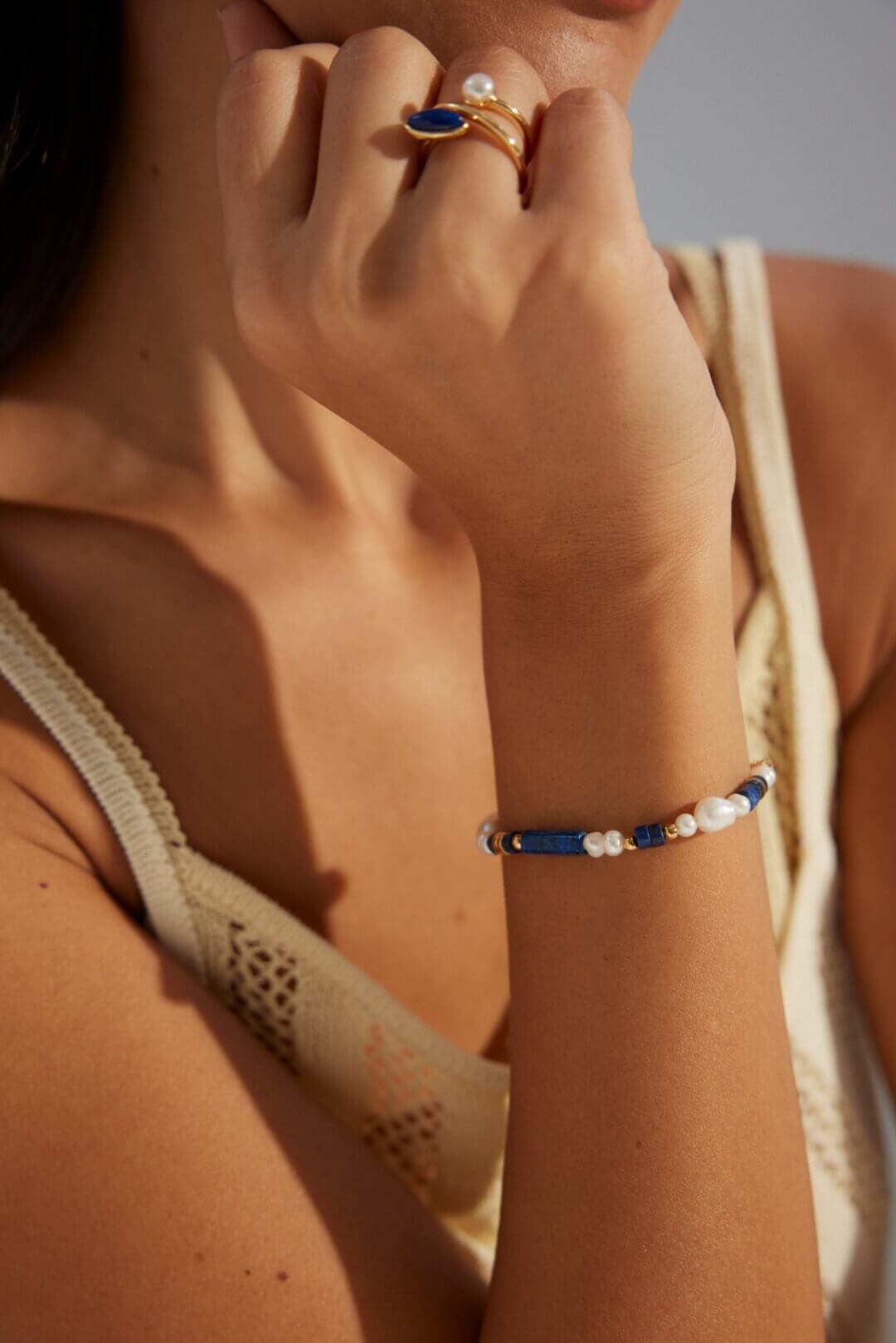 Close-up detail of the deep blue synthetic lapis lazuli beads.
