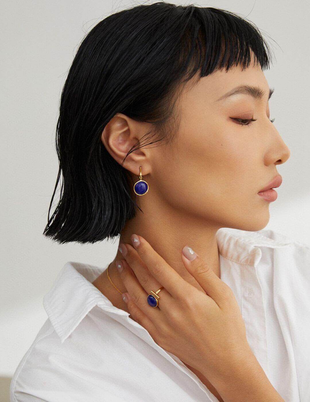 Natural Lapis Lazuli earrings adding vintage charm and modern sophistication to professional work attire.