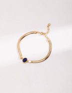 Vintage gold lobster clasp and extender chain detail on the bracelet.