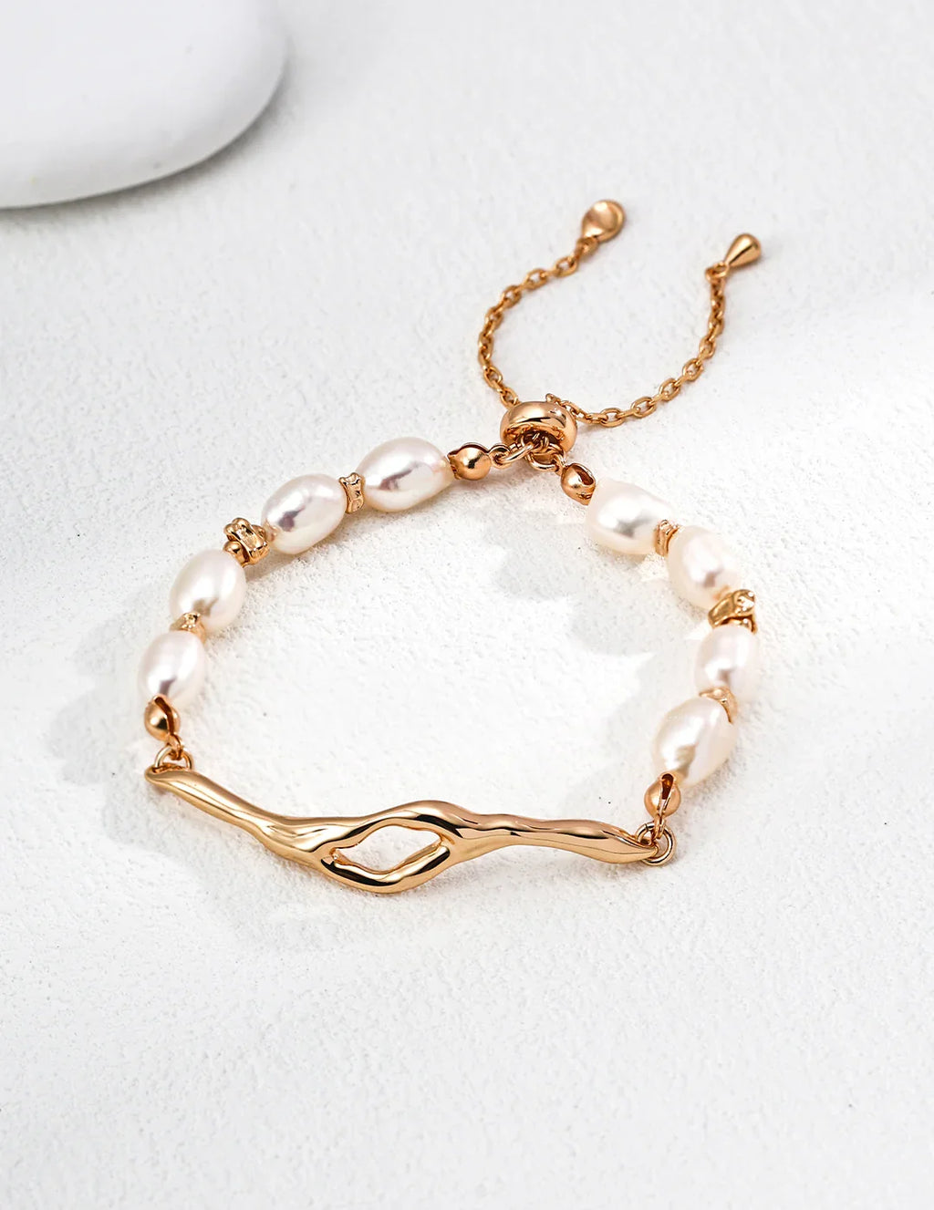Lava Series Baroque Pearl Bracelet in 925 Sterling Silver. Minimalist design featuring a textured silver band and a natural pearl.