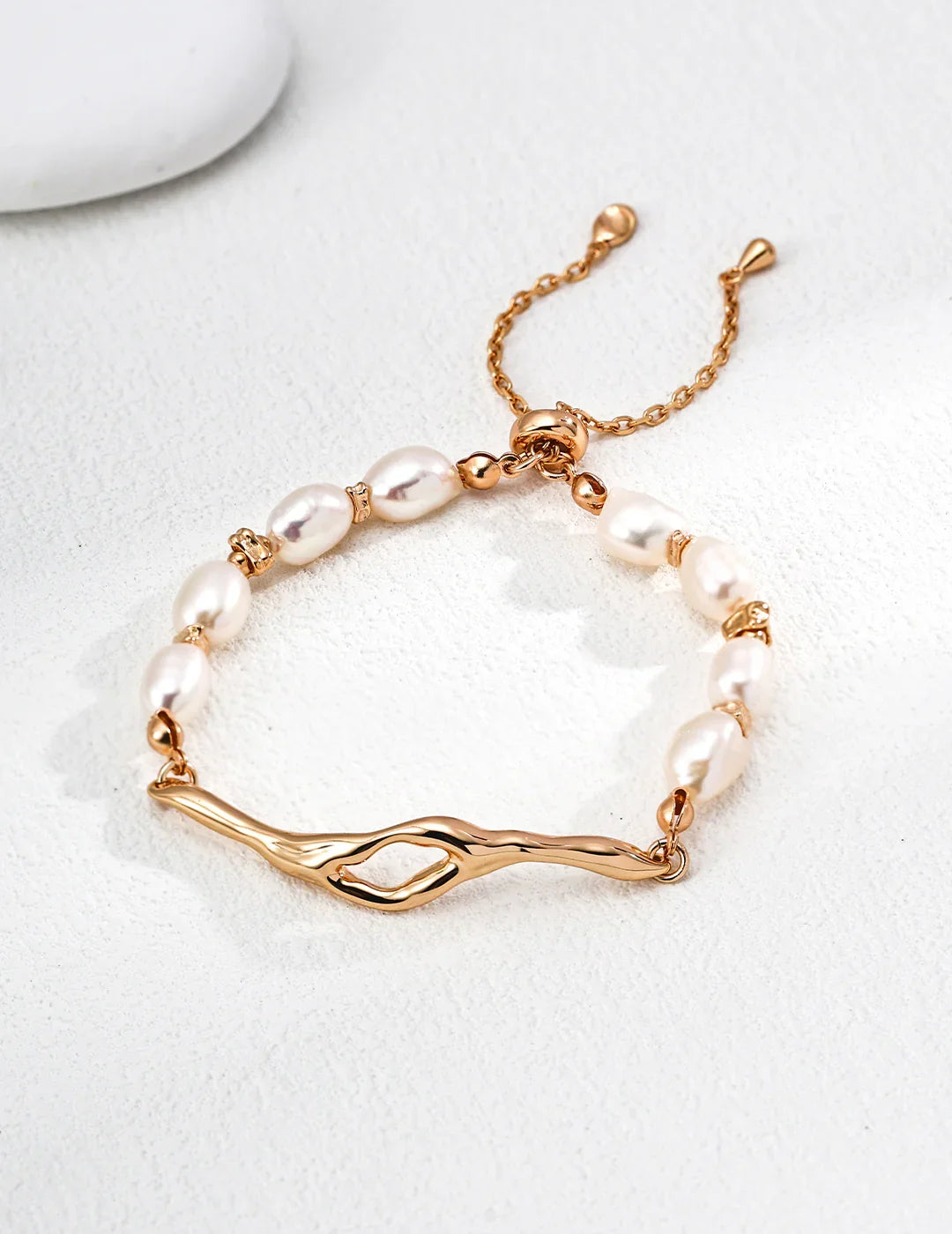 Lava Series Baroque Pearl Bracelet in 925 Sterling Silver. Minimalist design featuring a textured silver band and a natural pearl.