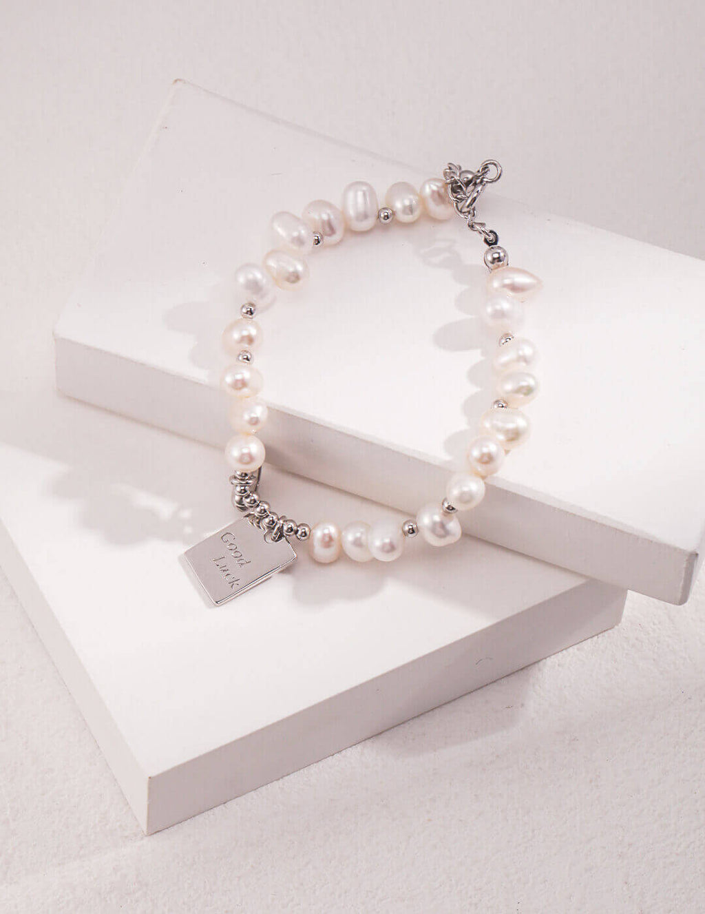 Close-up of the adjustable lobster clasp and extender chain.