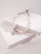 Close-up of the adjustable lobster clasp and extender chain.