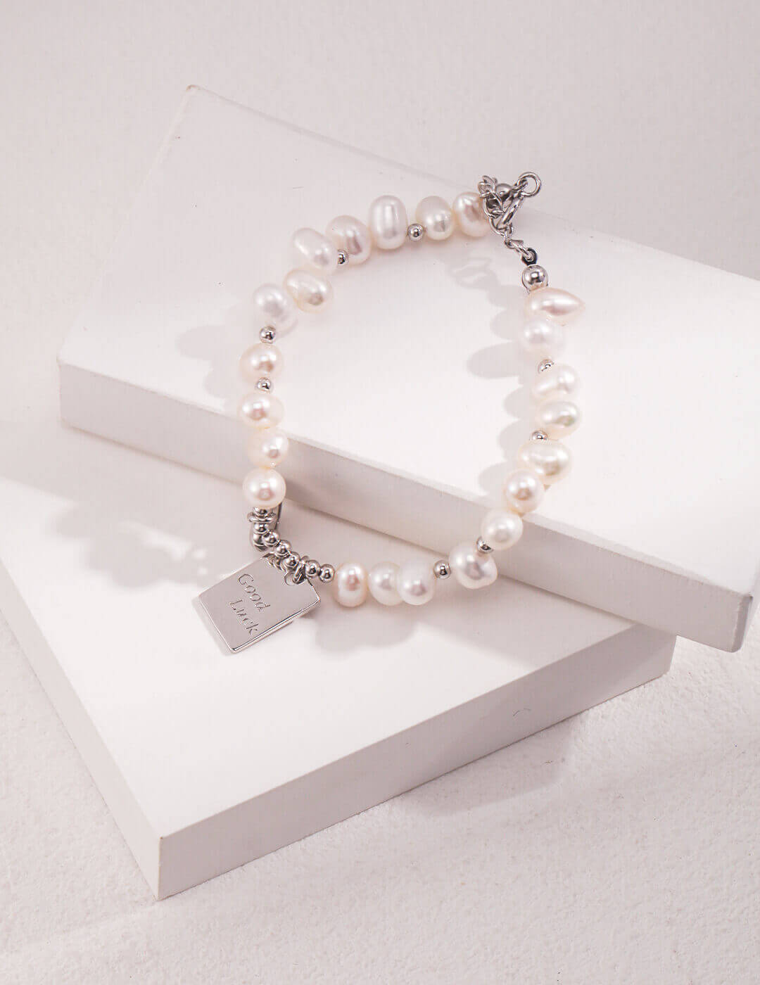 Close-up of the adjustable lobster clasp and extender chain.