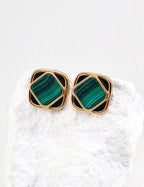 Detailed view of the green malachite and black onyx stones, creating a vintage color palette like a starry sky.