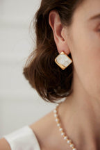  Unique mosaic earrings blending medieval and modern styles for special occasions.