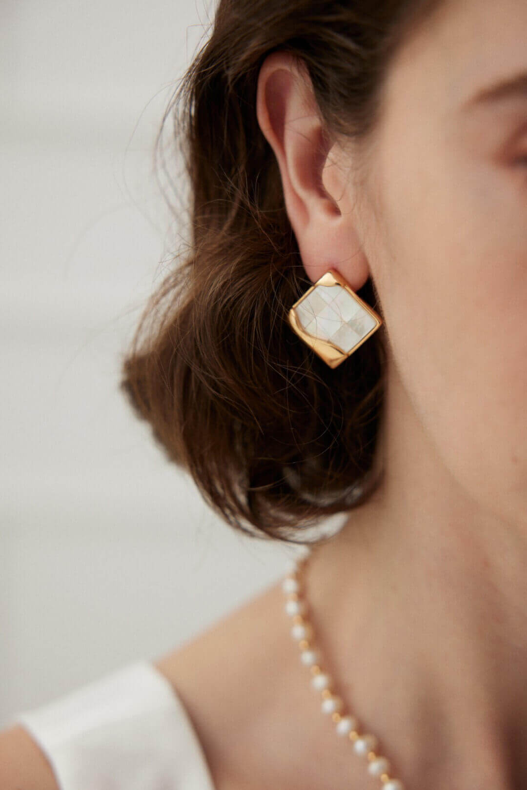  Unique mosaic earrings blending medieval and modern styles for special occasions.