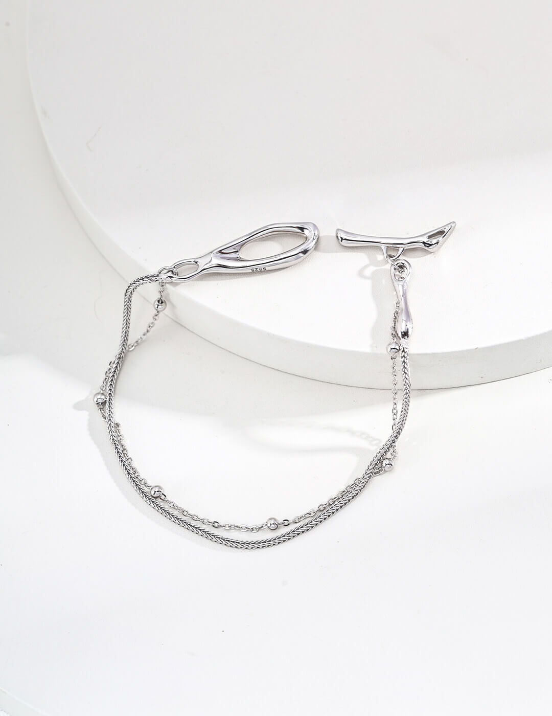 The minimalist bracelet in a warm vintage gold finish.