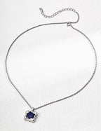 Lapis lazuli pendant necklace with classic silver frame.