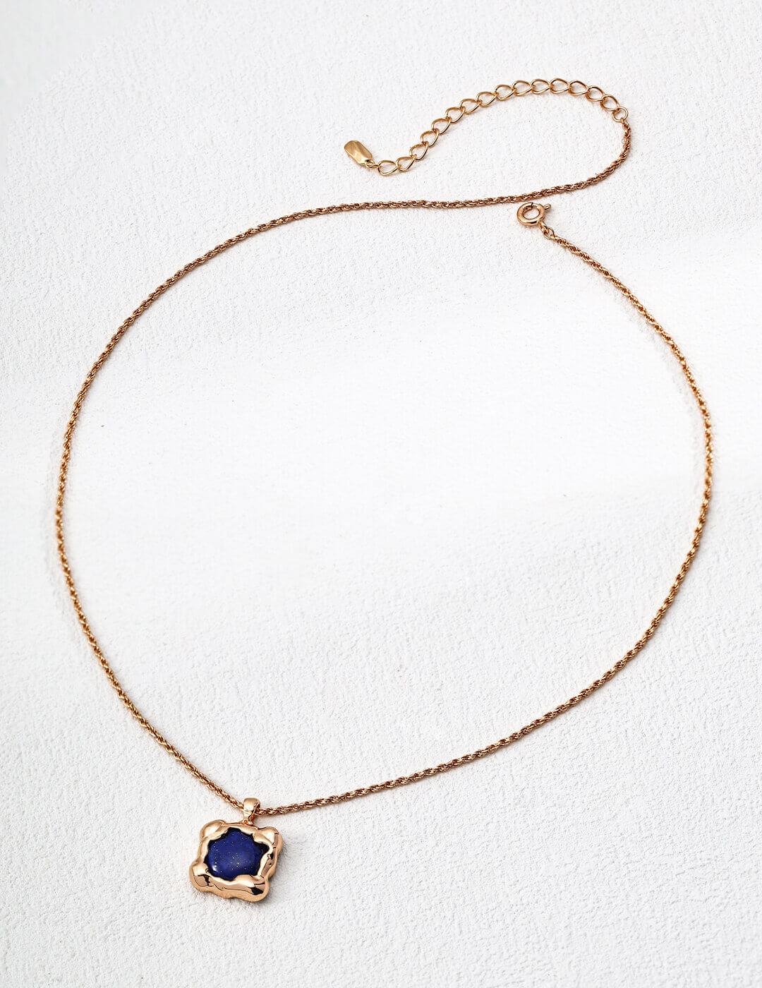 Lapis lazuli pendant necklace with vintage gold plated frame.