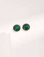 Front view of minimalist French S925 sterling silver malachite stud earrings on a white background