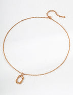The textured pendant necklace with a warm vintage gold finish.