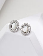shell stud earrings in classic Silver plating.
