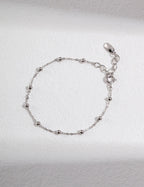 Solo shot of the dainty S925 silver bracelet from the set.