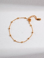 Close-up detail of the lobster clasps and extender chains on both pieces.