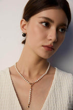 The earrings in natural daylight, showing the true color of the stones.