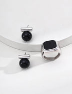 Tiger's Eye and Onyx stud earrings in classic Silver plating.