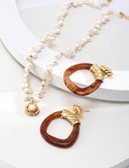 Soft natural lighting highlighting the camellia pendant's elegant details.