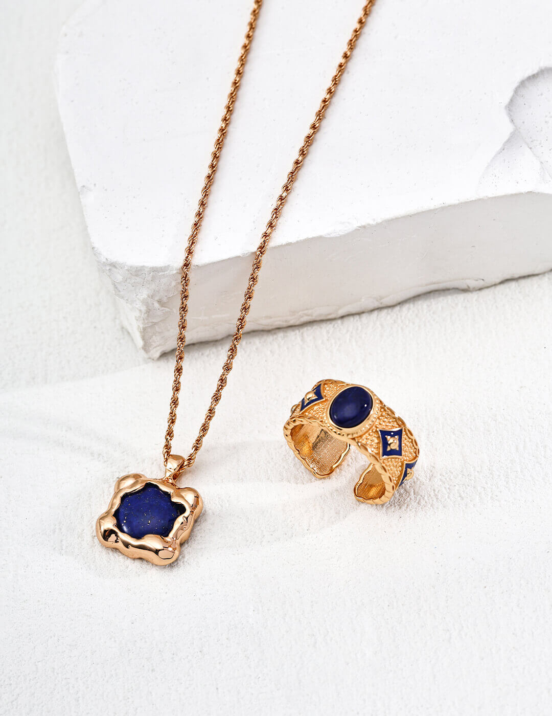 Model showcasing vintage gold version of lapis lazuli necklace.