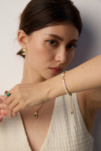 Lifestyle shot of woman wearing the bracelet in daily activity.