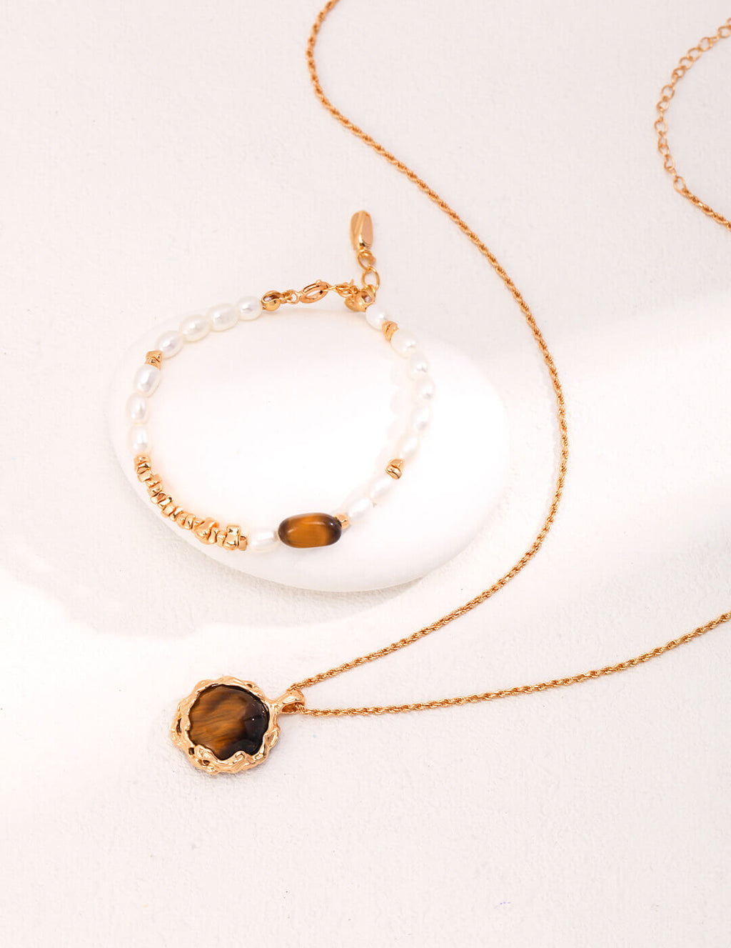 The pendant with boho-style clothing, emphasizing its earthy, artistic vibe.