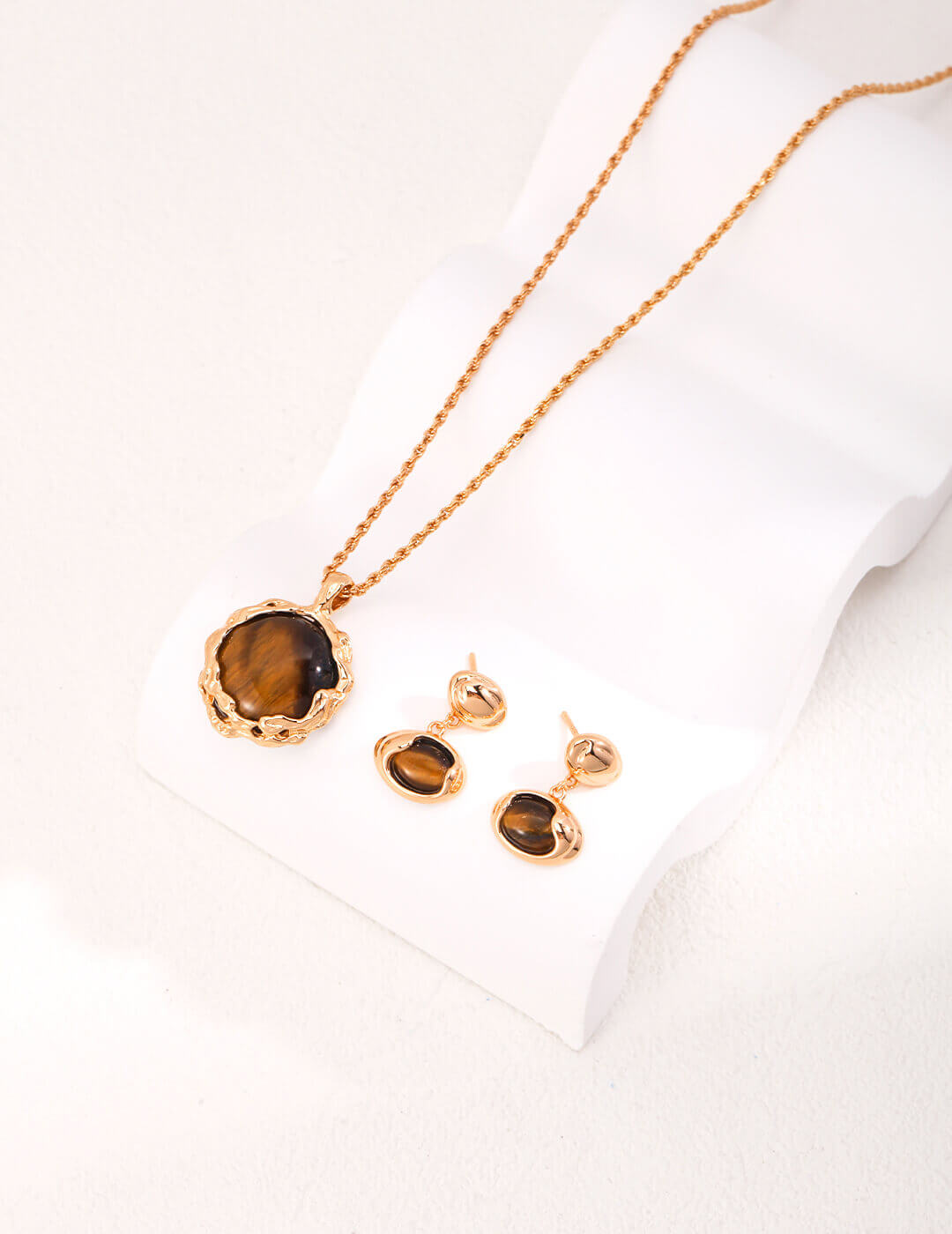 The artistic pendant paired with a casual, modern outfit.