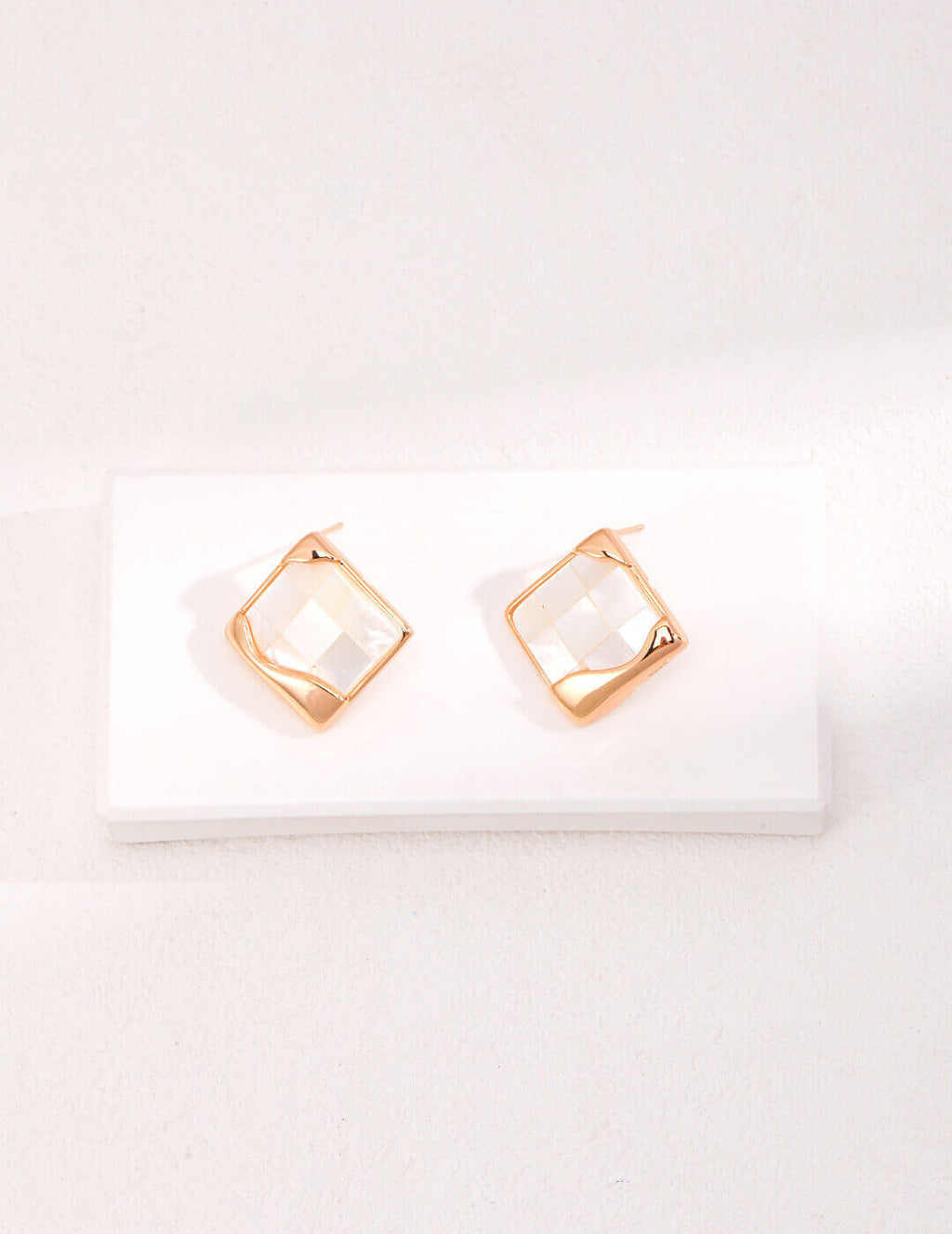 Mosaic shell earrings in sterling silver featuring ancient Greek design with contemporary minimalist aesthetic.