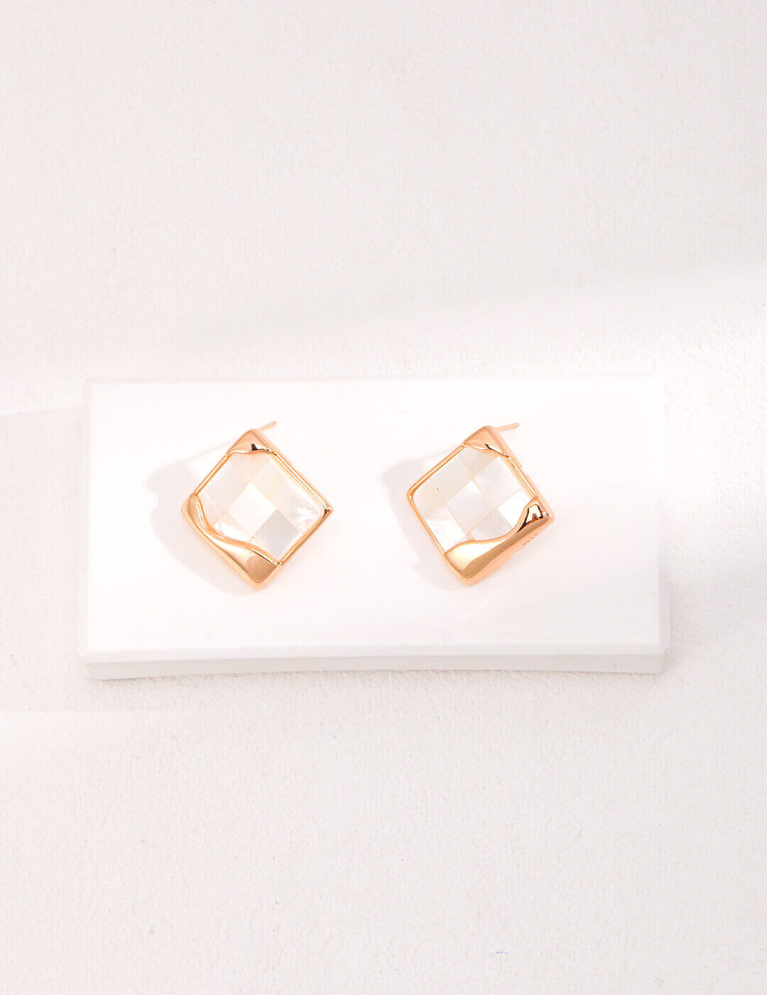 Mosaic shell earrings in sterling silver featuring ancient Greek design with contemporary minimalist aesthetic.