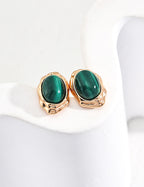 Front view of natural malachite stud earrings in S925 sterling silver and vintage gold plating.