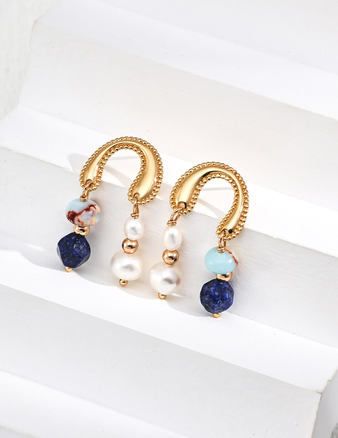 Exquisite drop earrings blending the celestial blue of Lapis Lazuli, warm tones of Shoushan Stone, and soft glow of natural pearls in elegant bohemian style.