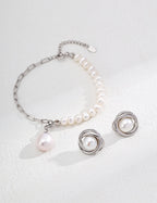 Close-up shot of the luminous 9mm natural pearl, showing its luster.