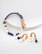  Soft organic glow of 6mm and 3mm natural pearls, adding luminosity to the bohemian drop earrings.