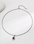 Tiger's Eye pendant necklace with silver plating and chain.