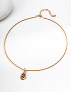 Tiger's Eye pendant necklace with vintage gold plating and chain.