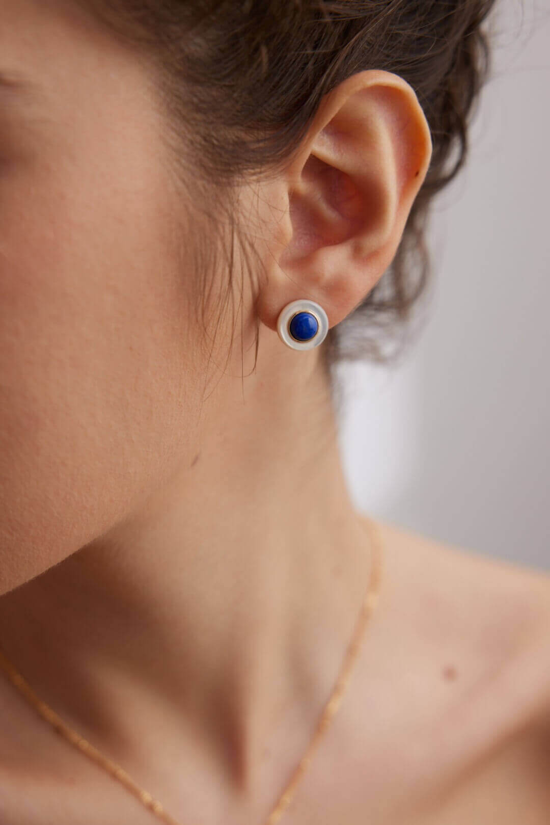 Oceanic iridescence earrings bringing subtle elegance to weekend casual style and relaxed occasions.