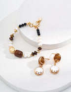 Close-up of the 4mm black onyx beads providing contrast in the design.