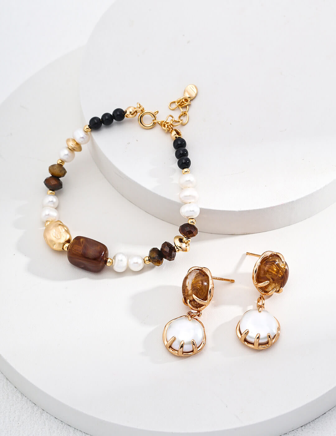 Close-up of the 4mm black onyx beads providing contrast in the design.